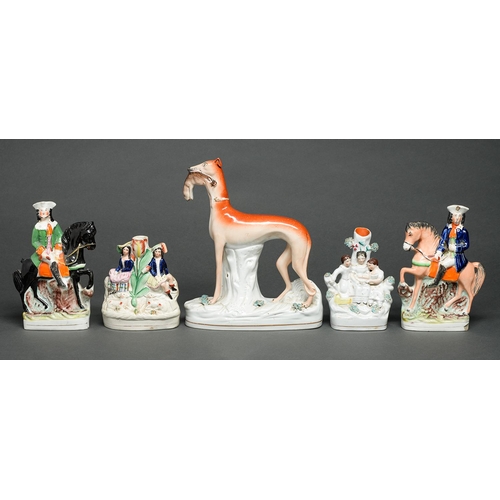 64 - A Staffordshire earthenware model of a greyhound with hare, pair of highwaymen flatback figures and ... 