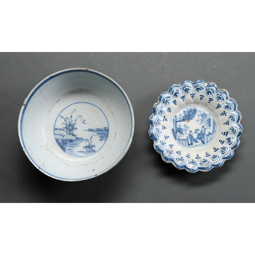 72 - An English Delftware bowl, probably Lambeth, c1770, painted with island landscapes, 22cm diam and a ... 