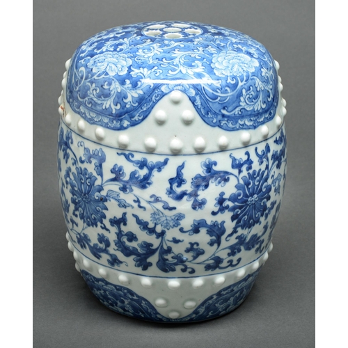 77 - A Chinese blue and white garden seat, Qing dynasty, late 19th c, of typical barrel shape with two ro... 