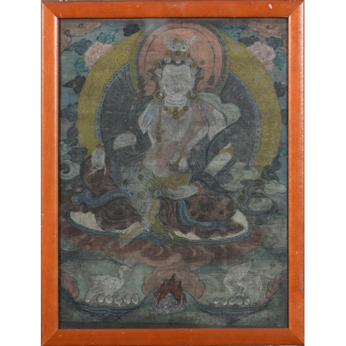 782 - Thangka of Green Tara, 19th c, pigment on cotton cloth, 61 x 42cm, stapled to wood surround, unframe... 