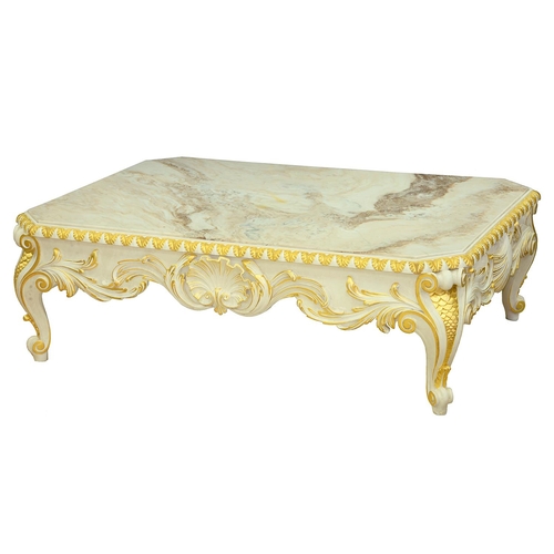 801 - A marble, parcel gilt and white painted wood table, Thomas Messel Ltd, the cut cornered slab within ... 