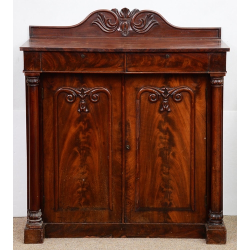 965 - A Victorian mahogany chiffonier, the doors with curl veneered panel in carved surround flanked by pi... 