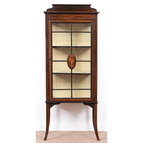 988 - An Edwardian mahogany china cabinet, the glazing bars to the door centred by an oval medallion inlai... 