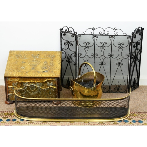 992 - A Victorian brass and steel mesh fender, 96cm l, a wrought iron fire basket, brass coal scuttle and ... 