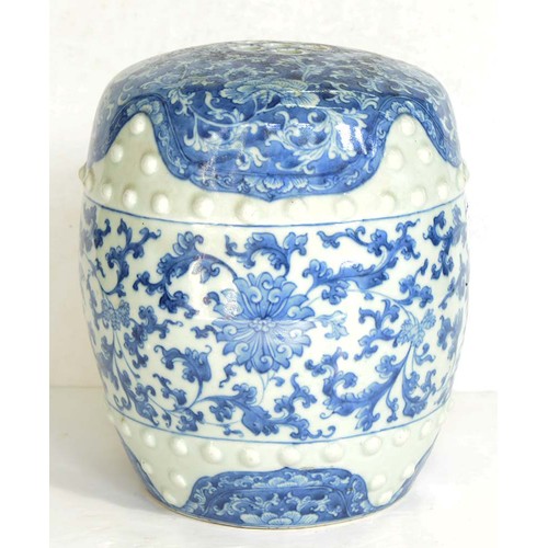 77 - A Chinese blue and white garden seat, Qing dynasty, late 19th c, of typical barrel shape with two ro... 