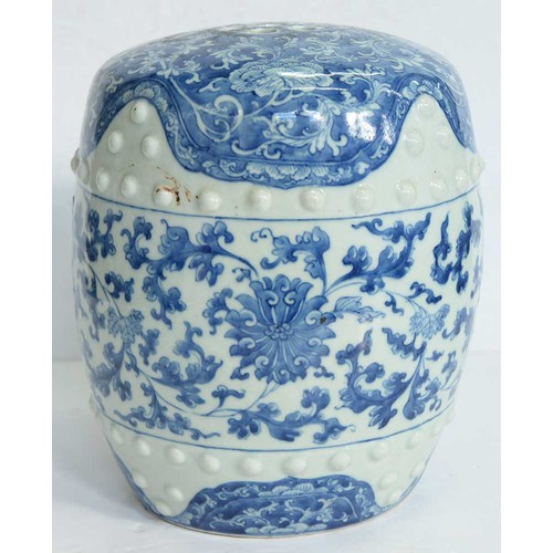 77 - A Chinese blue and white garden seat, Qing dynasty, late 19th c, of typical barrel shape with two ro... 