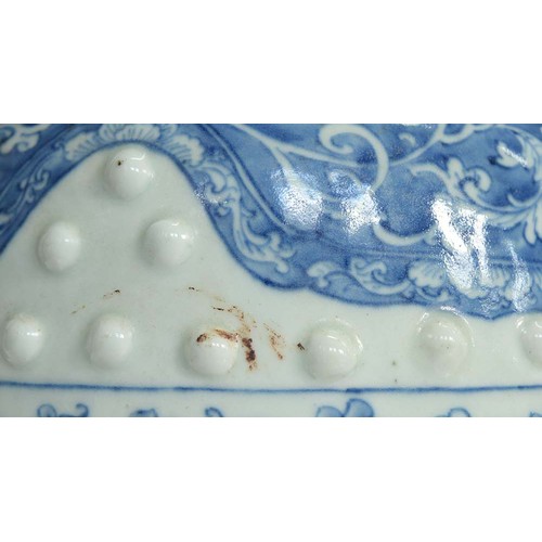 77 - A Chinese blue and white garden seat, Qing dynasty, late 19th c, of typical barrel shape with two ro... 