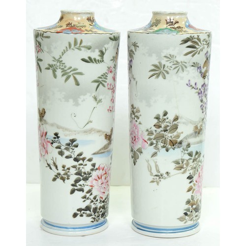 154 - A pair of Japanese cylindrical porcelain vases, early 20th c, painted with finches and flowering pla... 
