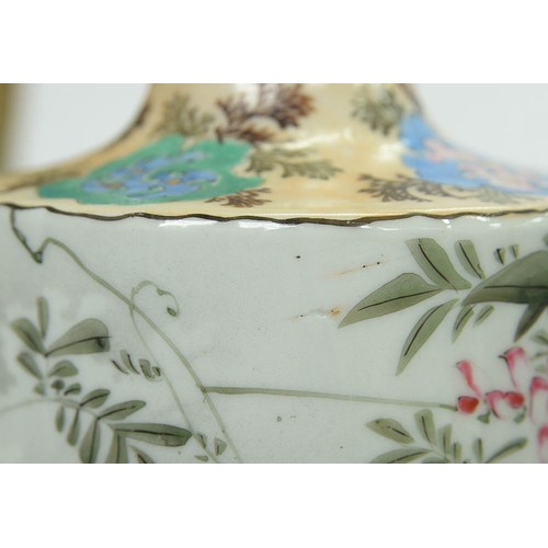 154 - A pair of Japanese cylindrical porcelain vases, early 20th c, painted with finches and flowering pla... 