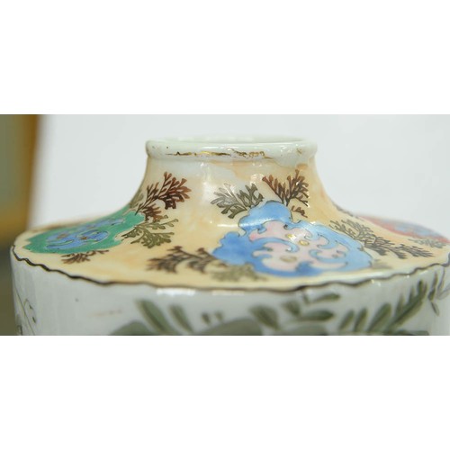 154 - A pair of Japanese cylindrical porcelain vases, early 20th c, painted with finches and flowering pla... 