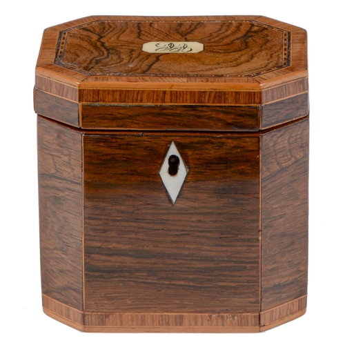 897 - A George III rosewood tea caddy, of cut cornered shape, crossbanded and line inlaid, with ivory escu... 