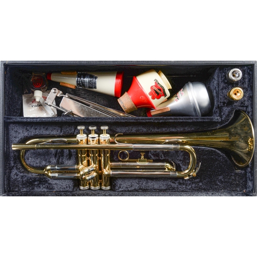 951 - A trumpet, Boosey & Hawkes Besson 600, with mouthpieces, three mutes and music rest, cased... 