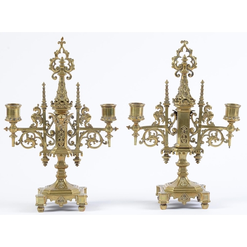 962 - A pair of Victorian brass gothic twin branch candelabra, c1870, 30cm h