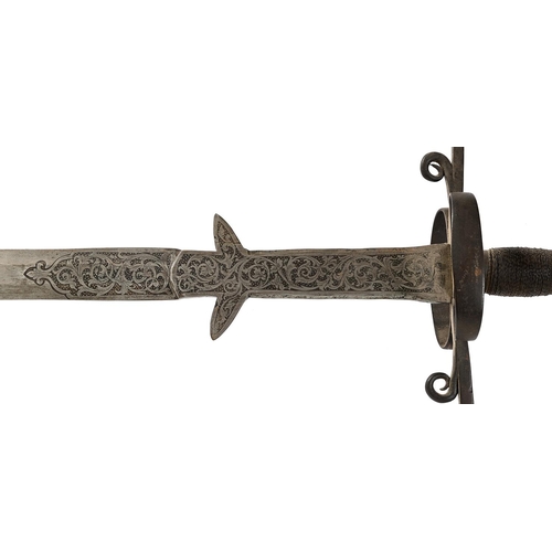 970 - A German hand-and-a-half sword, 19th c, in 16th c style, the broad flat double-edged blade, ricasso ... 