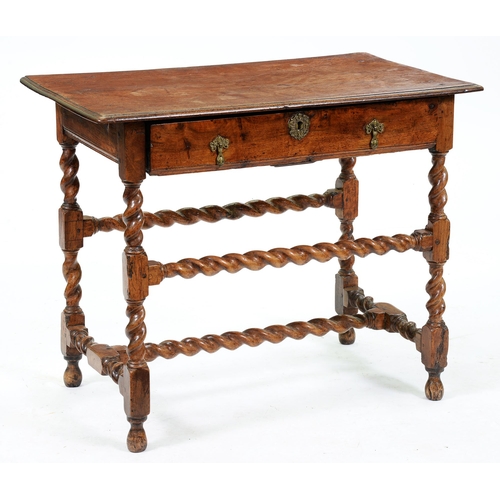 1107 - A William III walnut side table, the oversailing rectangular top with ovolo lip, the drawer and side... 