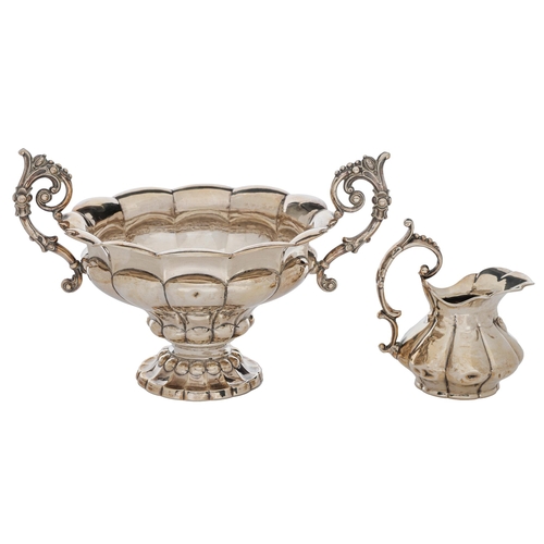 375 - A French silver cream jug and sugar bowl, mid 19th c,  of lobed form with leafy, beaded scroll ... 