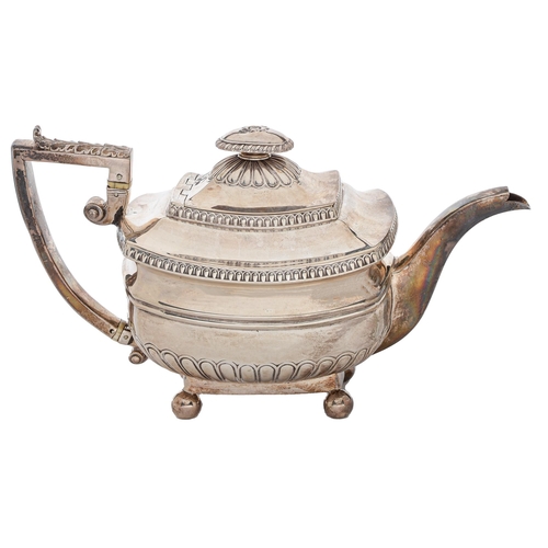 378 - A George III silver teapot,  with acanthus capped handle and integral joint, on ball feet, 15cm... 