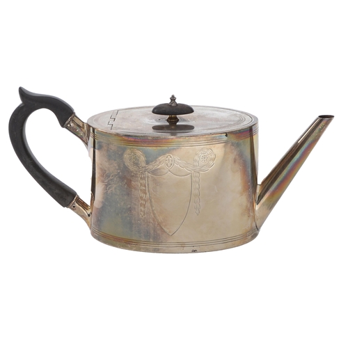 385 - A Victorian silver teapot,  of straight sided oval shape with integral joint to the flat lid, engrav... 