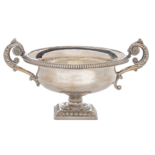 404 - A Swiss silver sugar bowl, early19th c, of vase shape with leafy scrolling handles, on square foot, ... 