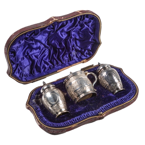 412 - A Victorian three piece silver  condiment set,  chased with bands of foliage, mustard... 