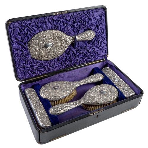 416 - A Victorian silver six piece brush set,  stamped with birds and chrysanthemums, by Arthur Fenwi... 