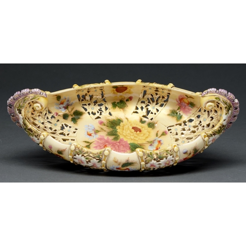 472 - A Zsolnay pierced and scroll handled bowl, late 19th c, decorated with flowers and gilt, 35cm l, imp... 