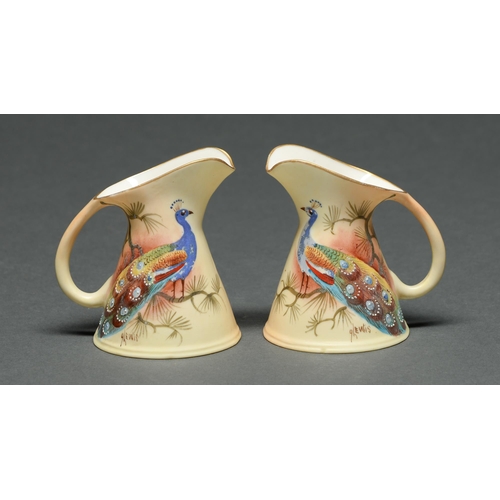 518 - A pair of Locke & Co Worcester jugs, c1900, painted by J Lewis, both signed, with a peacock... 