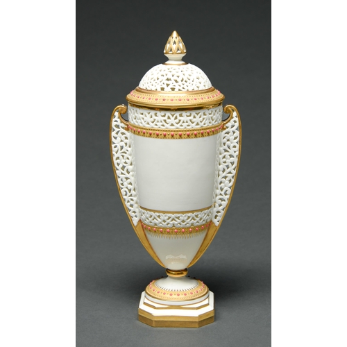 523 - A Grainger's Worcester reticulated vase and cover, c1890, with jewelled gilt borders, 29cm h, printe... 