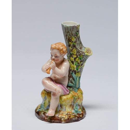 537 - A Royal Worcester figural spill holder, 1889,  modelled with a child piper on a tree stump, 14c... 