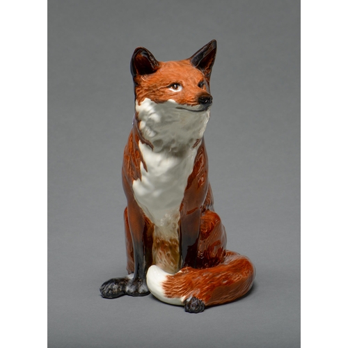 554 - A Beswick model of a fox,  31cm h, impressed mark and 23 **