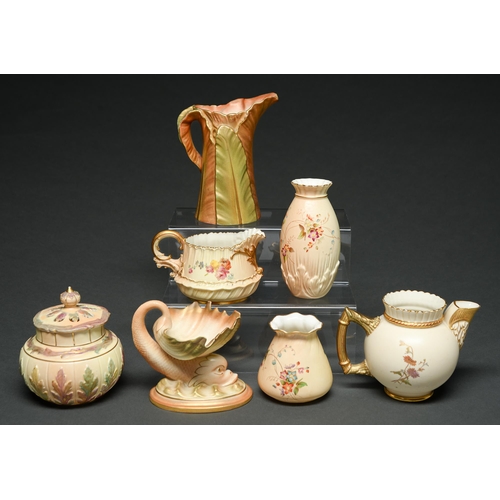 556 - A Royal Worcester shell-on-dolphin and six vases and jugs, c1900, various sizes, printed marks ... 