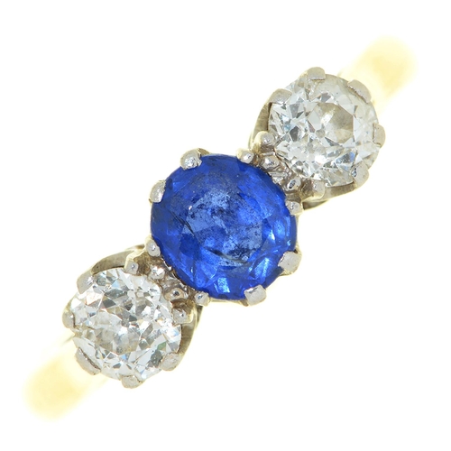 63 - A sapphire and diamond three stone ring, with old cut diamonds, gold hoop marked 18ct PLAT, 3.9g, si... 