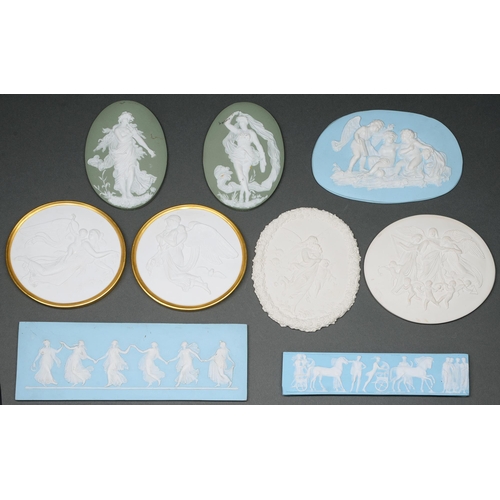 682 - Five and two pairs of porcelain bas relief tablets or plaques in the style of Wedgwood and other war... 