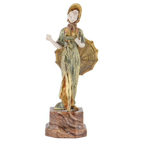 695 - A gilt bronze and ivory statuette of young woman with a parasol, c1920,  onyx base, 22cm hPlease not... 