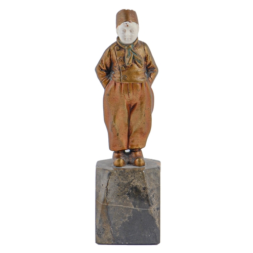 697 - An Art Deco bronze and ivory statuette of a Dutch boy, c1920, on marble base, 14cm hPlease note Mell... 