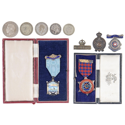 699 - Two silver gilt and enamel masonic jewels, crown 1935 and other coins, WWI brass IMPERIAL SERVICE ba... 