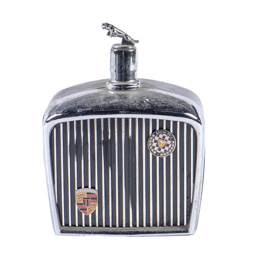 730 - Motoring interest. A chromium plated metal and black plastic motor car radiator novelty spirit flask... 