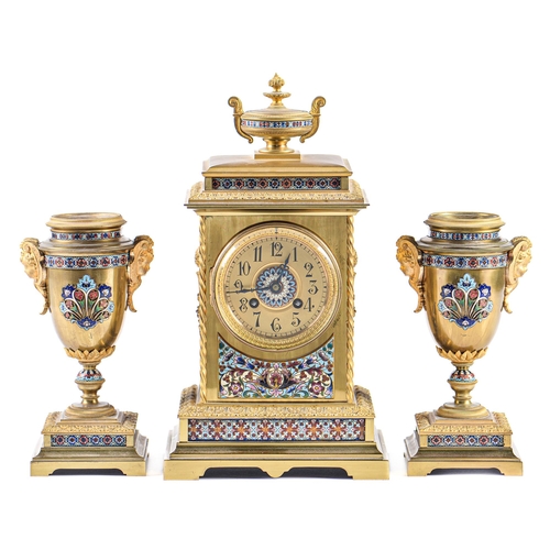 742 - A French brass and champlevé  enamel garniture de cheminee, late 19th c,  the pillar shaped clock su... 