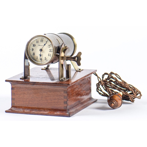 745 - A brass and mahogany battery illuminated night projection timepiece, Harrods Ltd London, early 20th ... 