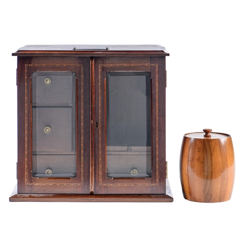 746 - An Edwardian mahogany and broken line inlaid smoker's cabinet, the fitted interior enclosed by a pai... 