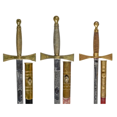 780 - Three masonic swords and scabbards, with brass or gilt lacquer brass cruciform hilt and brass mounte... 