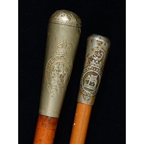 785 - Two officer's canes, with embossed nickel plated pommel, Duke of Wellington's Regiment... 