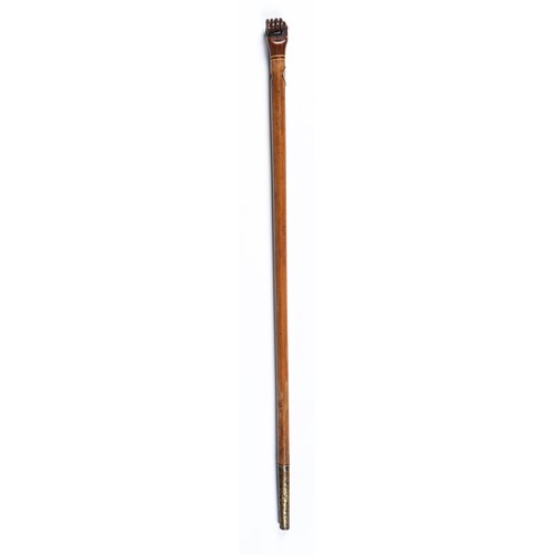 753 - A malacca cane, Pitcairn Island, early 20th c, with carved hardwood clenched fist pommel, stamped in... 