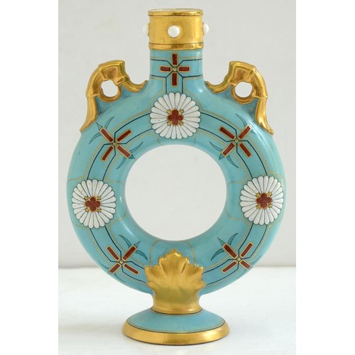 514 - A Royal Worcester aesthetic ring vase, 1874,  enamelled with white and red kiku mon on a blue g... 