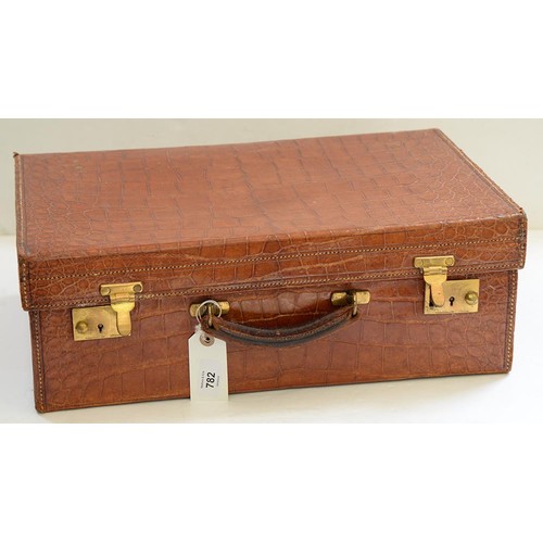 782 - A crocodile hide dressing case, early 20th c, marked on gilt brass locks Finnegans Ltd London, key, ... 