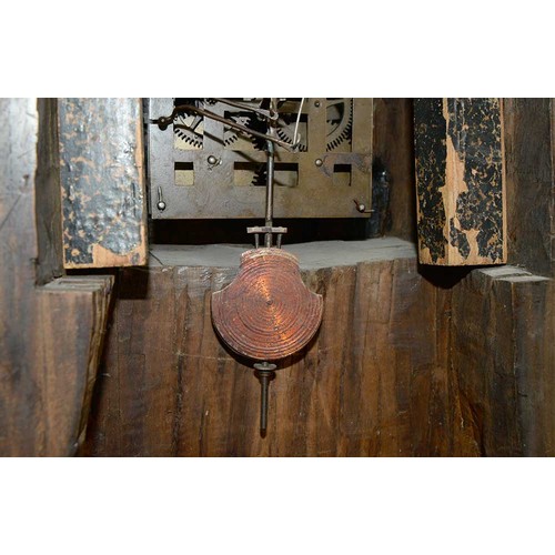 899 - A Swiss limewood cuckoo clock, late 19th c, in the form of a rocky crag surmounted by an eagle swoop... 