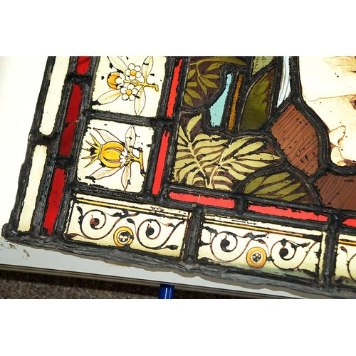 947 - A Victorian stained glass window light of a dog gazing at it's reflection in water, 52 x 37cm, unfra... 