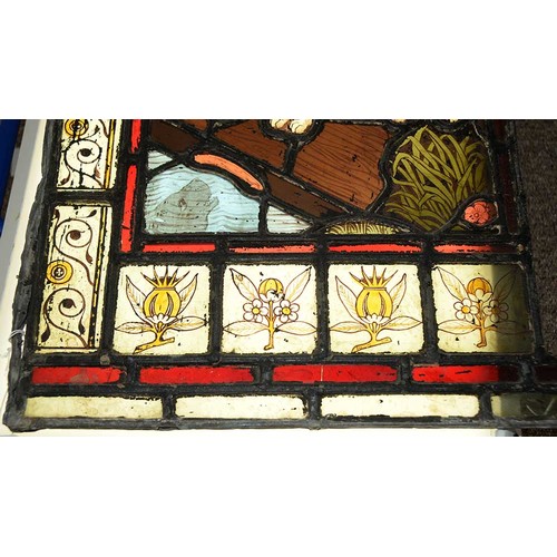 947 - A Victorian stained glass window light of a dog gazing at it's reflection in water, 52 x 37cm, unfra... 