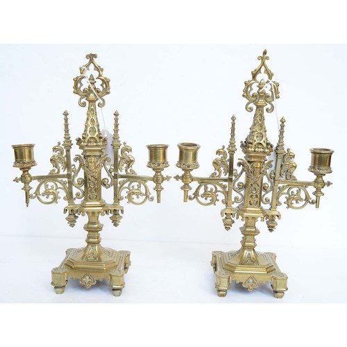 962 - A pair of Victorian brass gothic twin branch candelabra, c1870, 30cm h