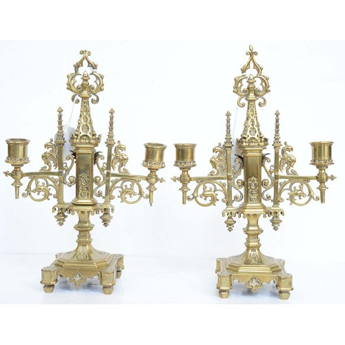 962 - A pair of Victorian brass gothic twin branch candelabra, c1870, 30cm h